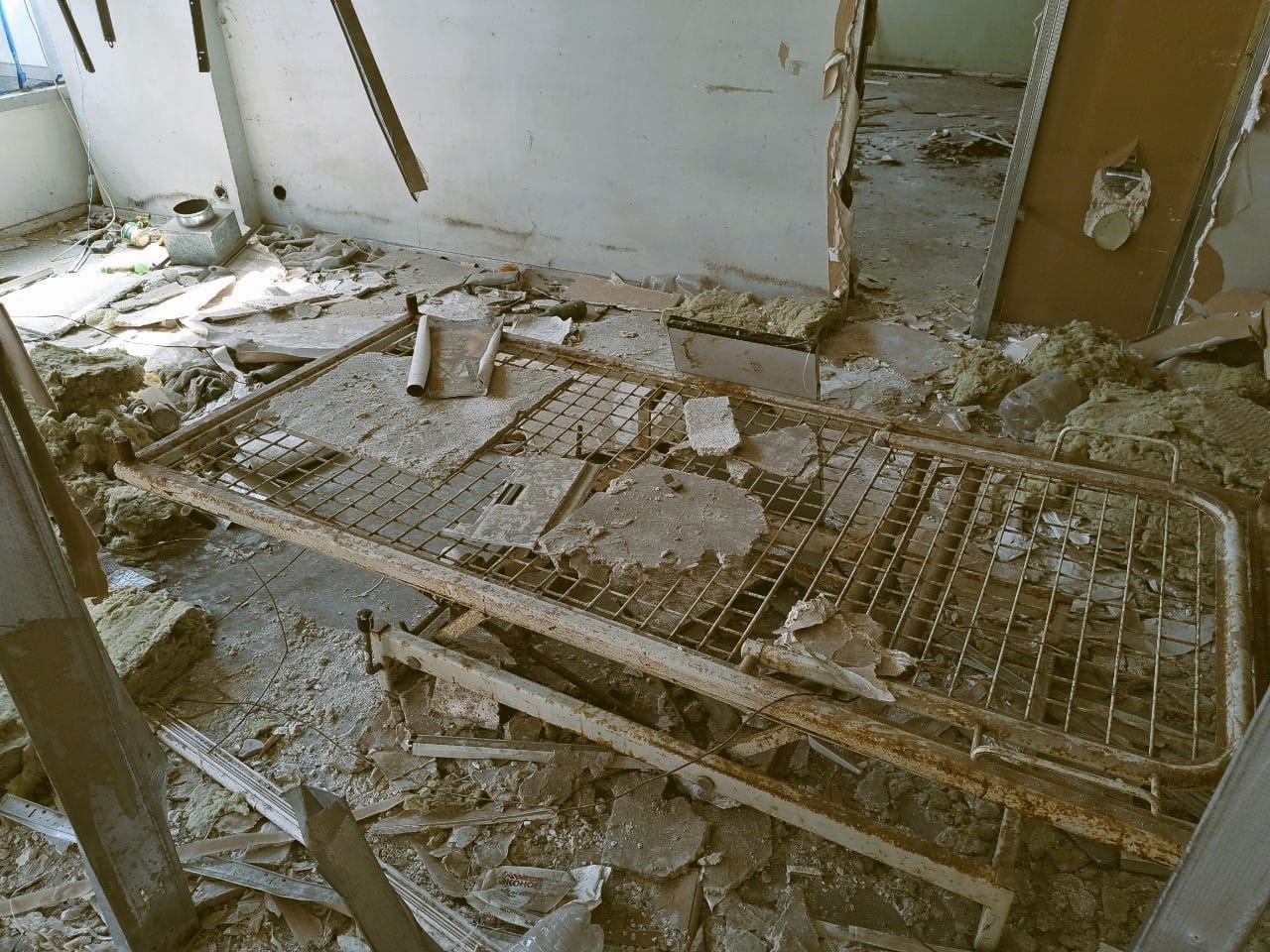 The frame of a bed on the airport grounds. Prisoners were handcuffed to the bed and it was used for their torture (Photo – Andrey Zhuravlev)